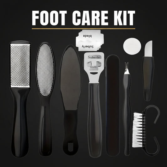 Set of black foot care tools on a white background