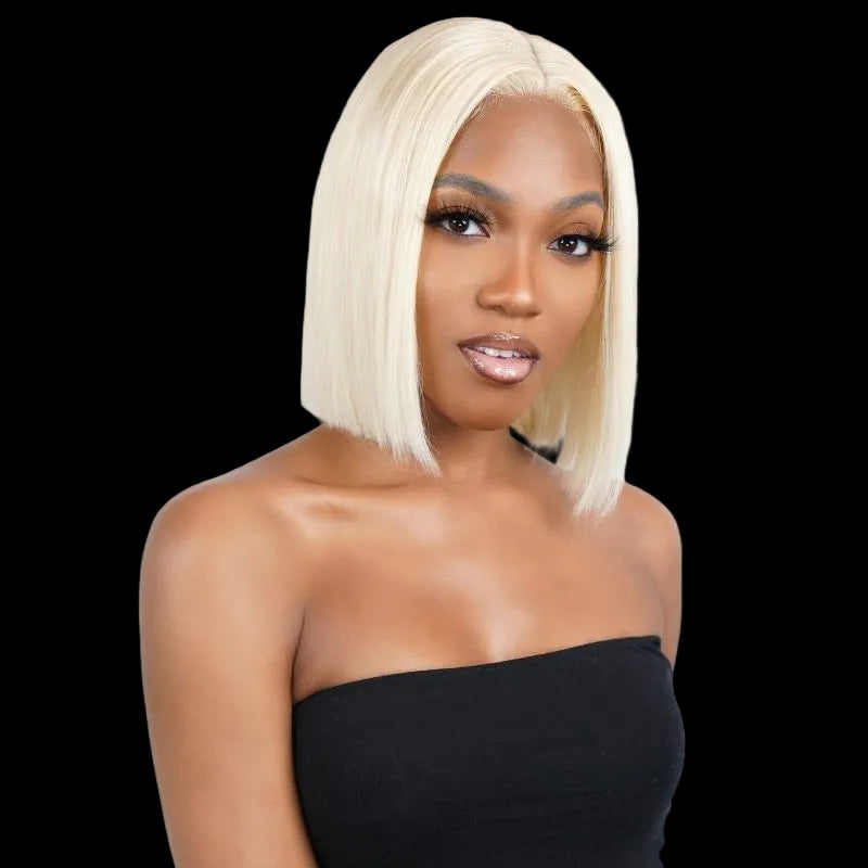 Woman with a blonde bob wig on a white background