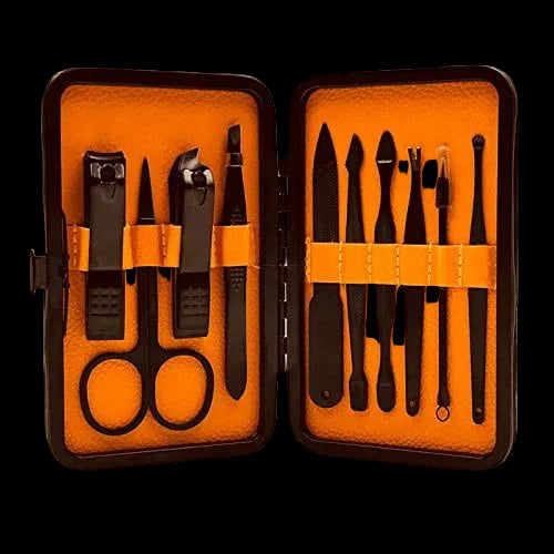 Manicure set with black tools in an open orange case on a white background