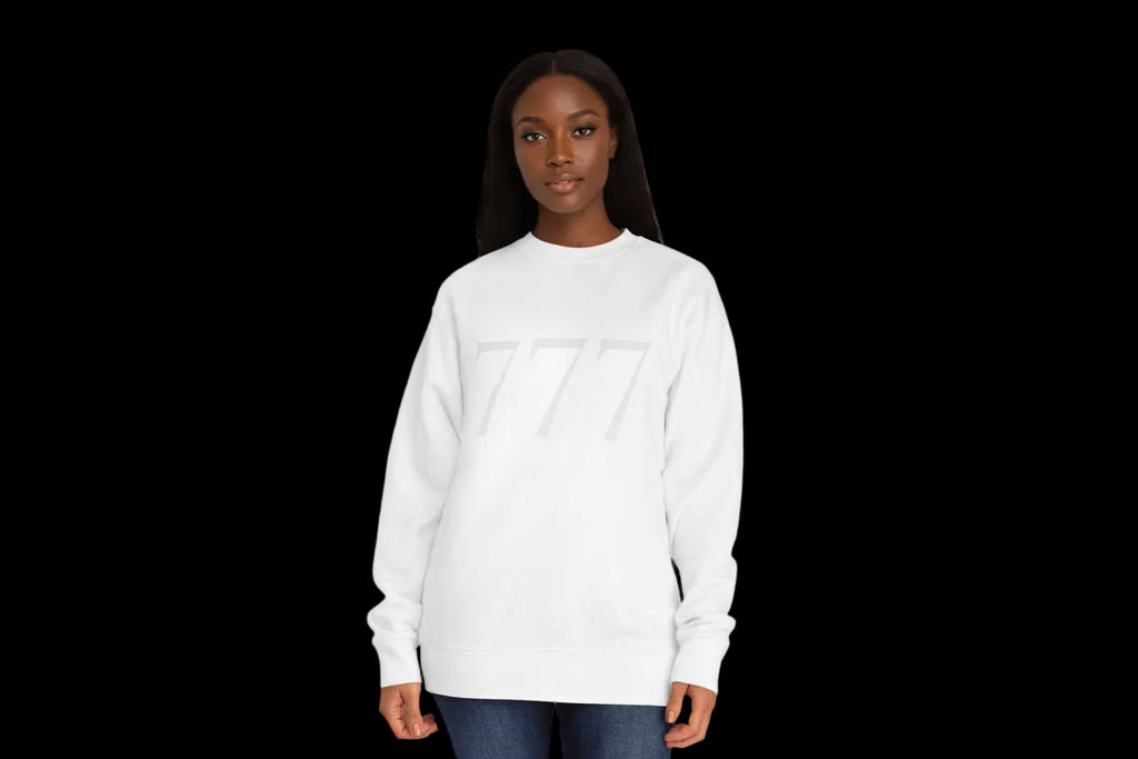 Person wearing a white sweatshirt with a logo on a black background