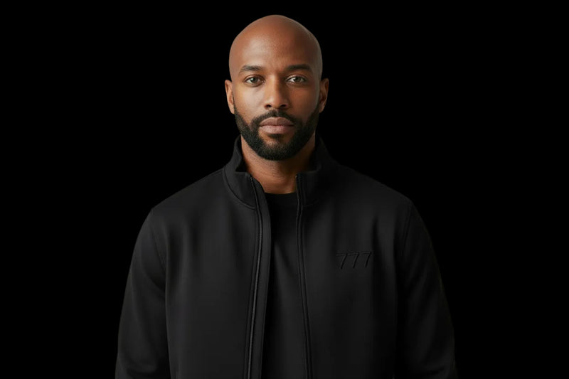 Black silhouette of a long-sleeve shirt on a white background