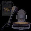 Grooming set with brushes and sandal from Happy Sol on a white background
