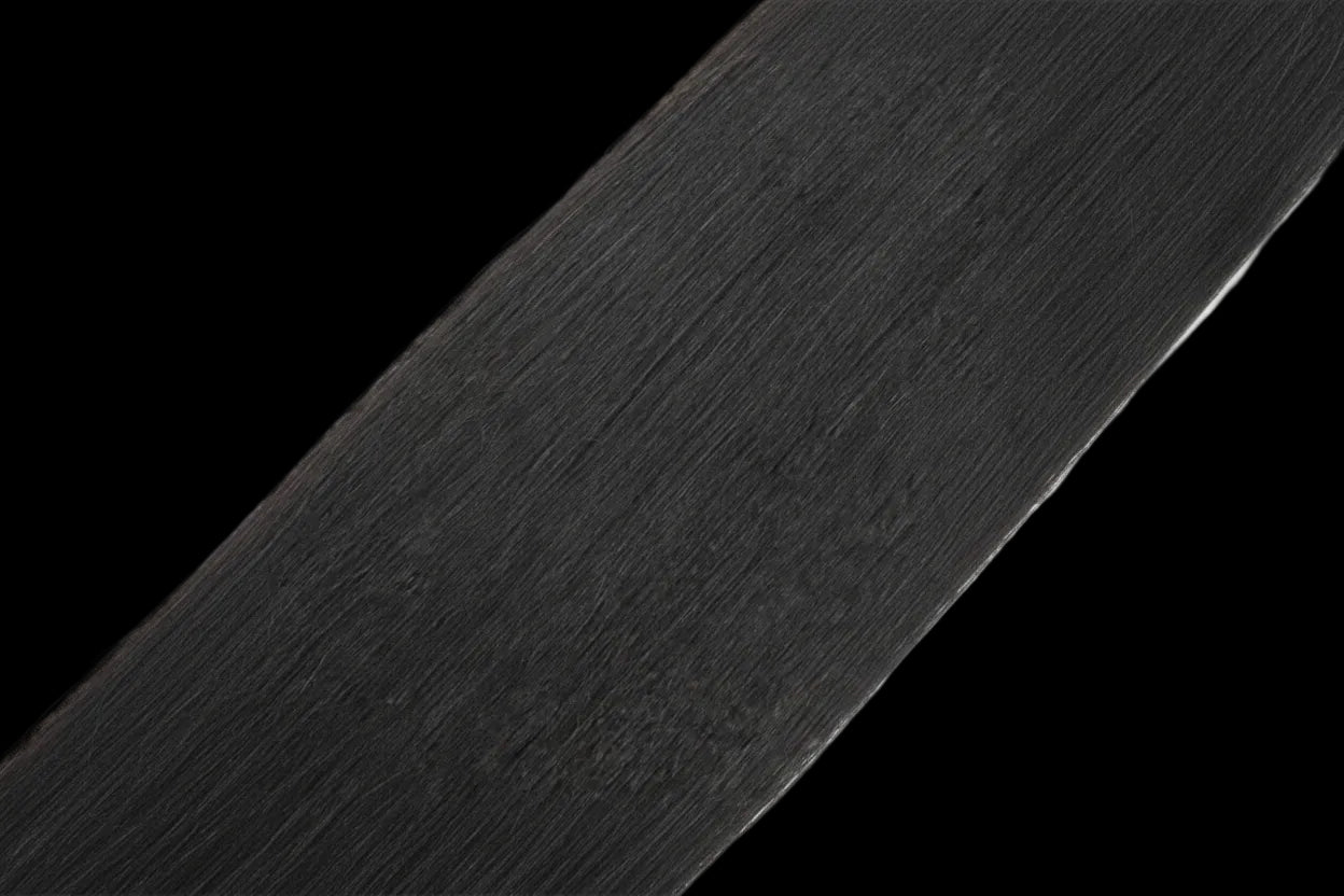 Close-up of black hair extensions on a white background