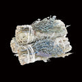 Three bundles of sage and lavender tied together on a white background