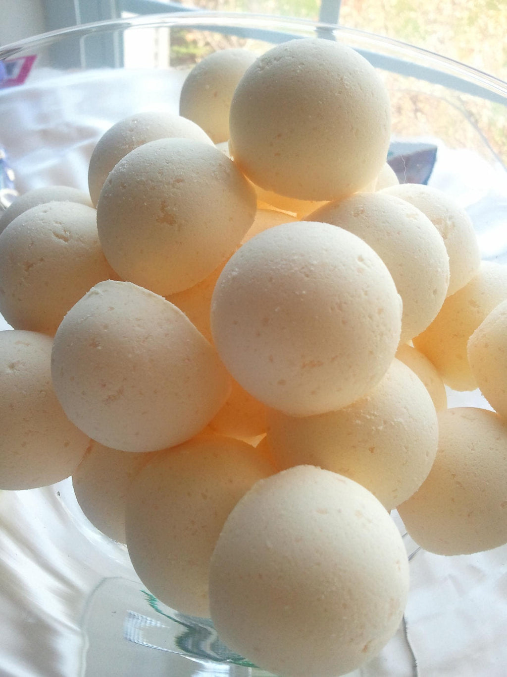 14 bath bombs (select from over 100 fragrances) our Little Bag of Balls (great for dry skin) by Spa Pure