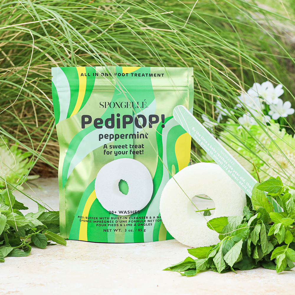 PediPOP peppermint foot treatment package with a pod on a natural background