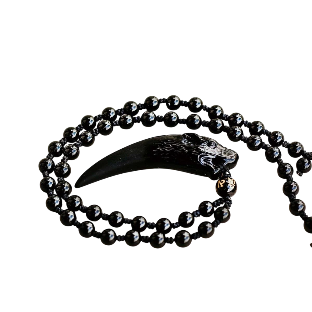 The Obsidian Wolf Pendant by Conscious Items