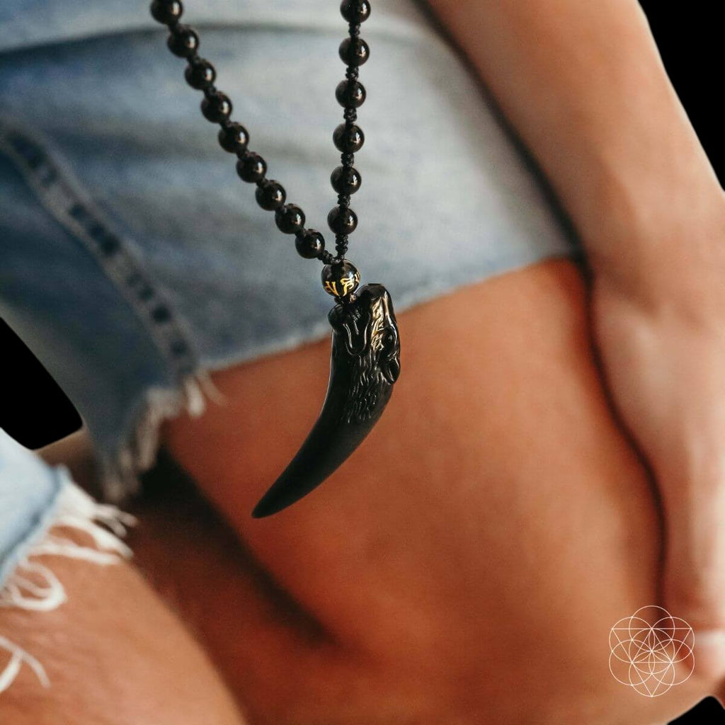 The Obsidian Wolf Pendant by Conscious Items