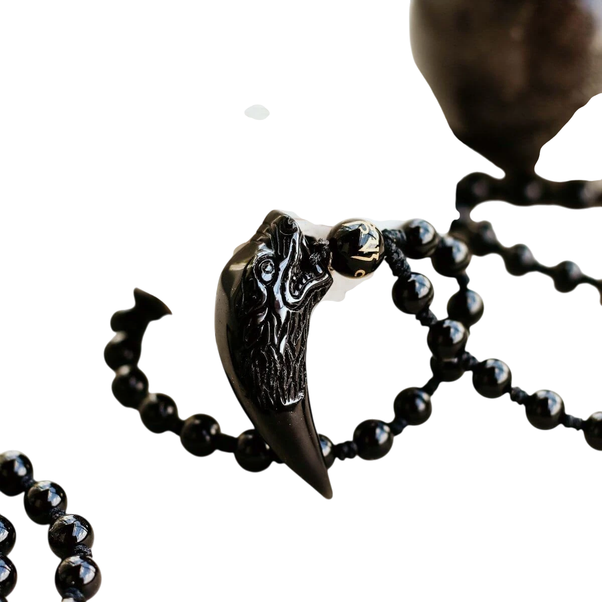 The Obsidian Wolf Pendant by Conscious Items