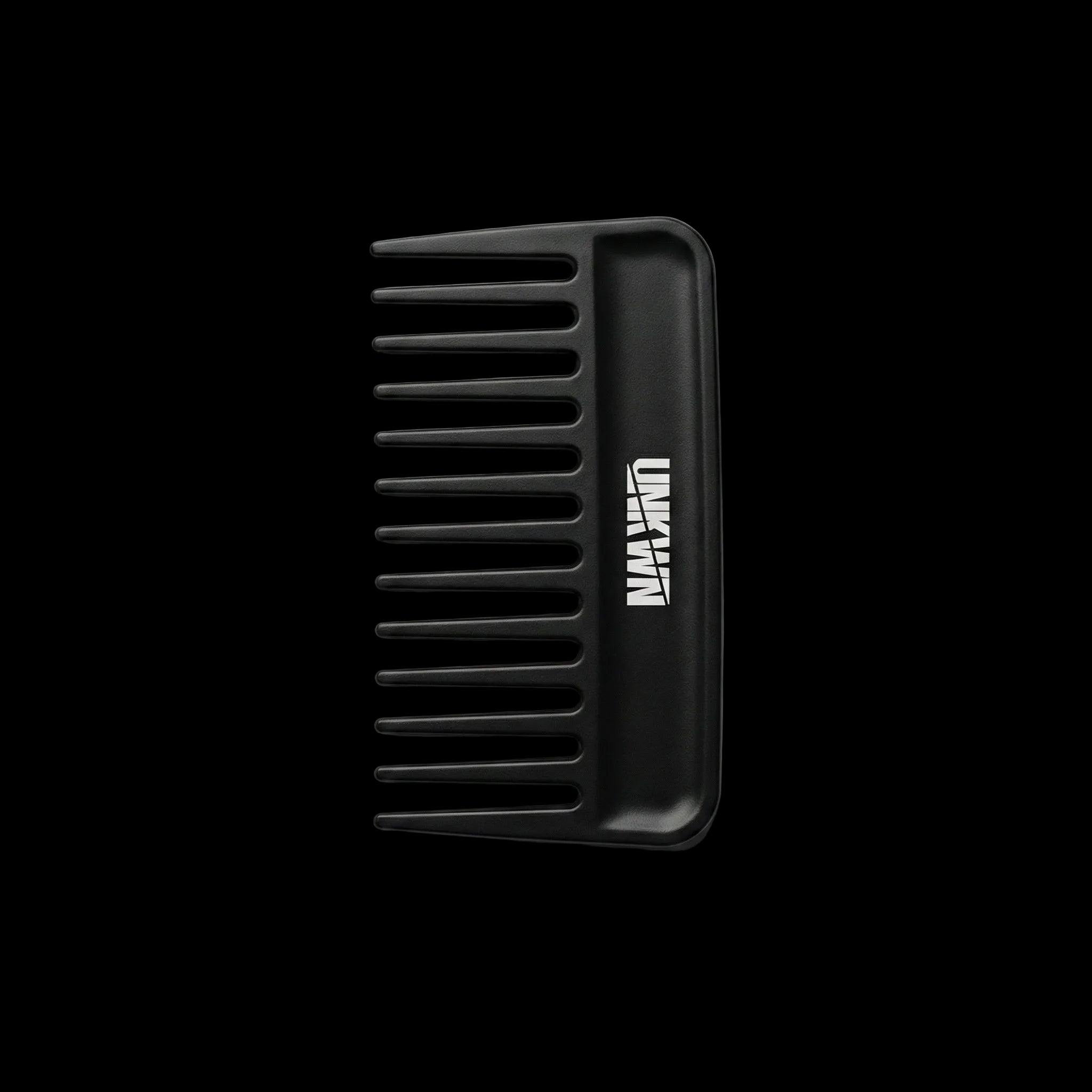 Black comb with a logo on a light gray background